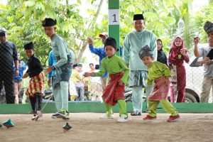 Wabup Siak Husni Merza Buka Festival Gasing Berembang Kampung Rawang Kao Barat